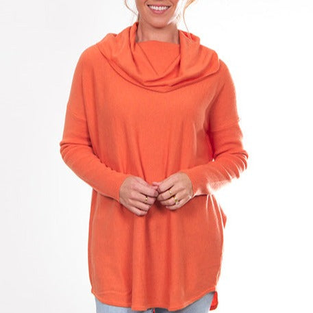 Bridge and Lord's women's curved hem cowl neck pullover in apricot crush