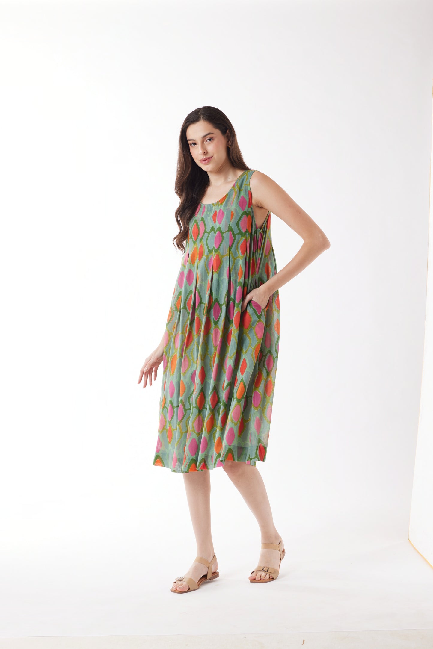 Woman wearing the Au Hasard D'Un Voyage's Sleeveless Dress in Green