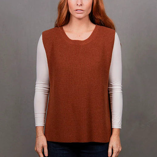 Woman wearing the Crew Neck Merino Vest in Cognac by Bridge and Lord
