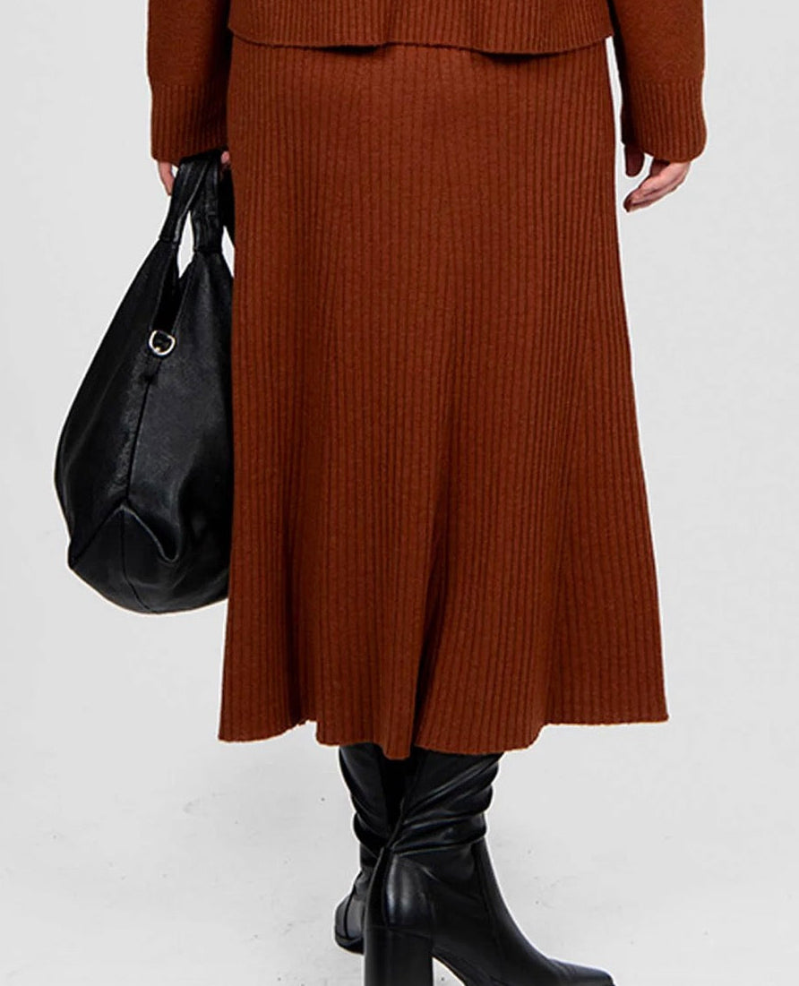 Woman wearing Bridge and Lord's ribbed Flared Skirt in Cognac brown