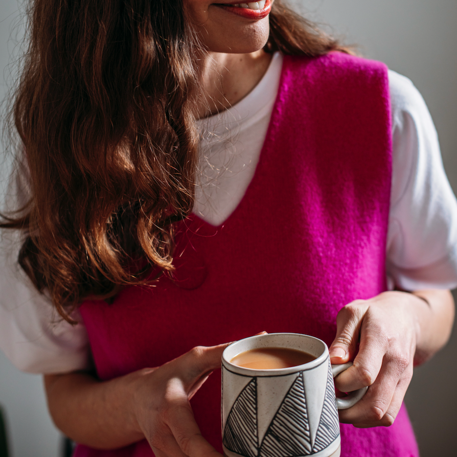 Eribé's merino Corry Vee Neck Tank Top in pink Honesty