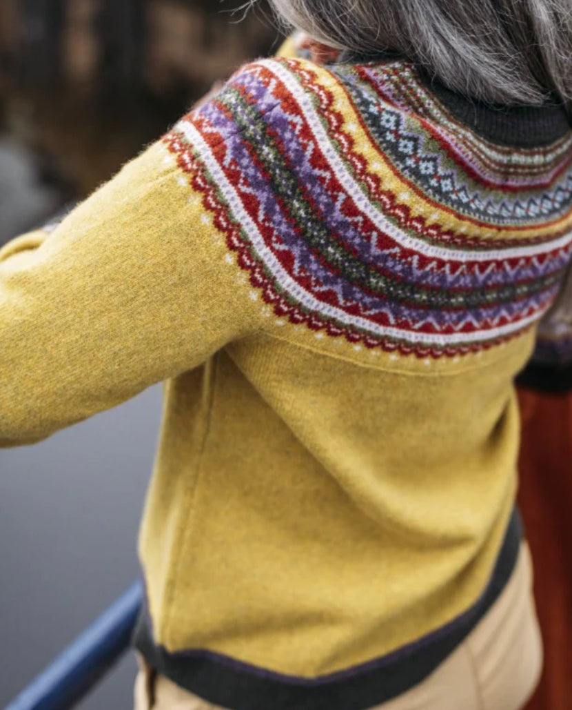 Woman wearing the Eribe Fair Isle Alpine Sweater in Findhorn