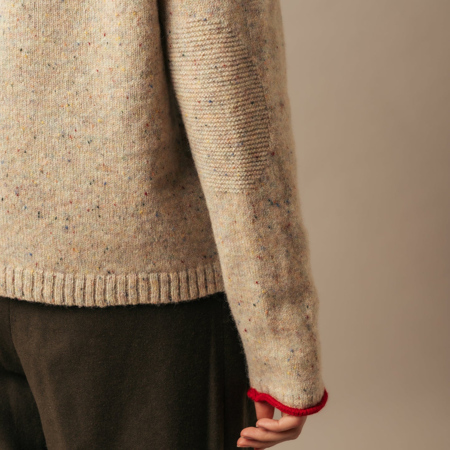 Eribe Tweed Sweater in Sand Elbow detail.