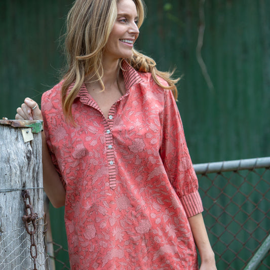 Woman wearing the Bella Floral Shirtdress by Mandalay Designs by Emma Strauss