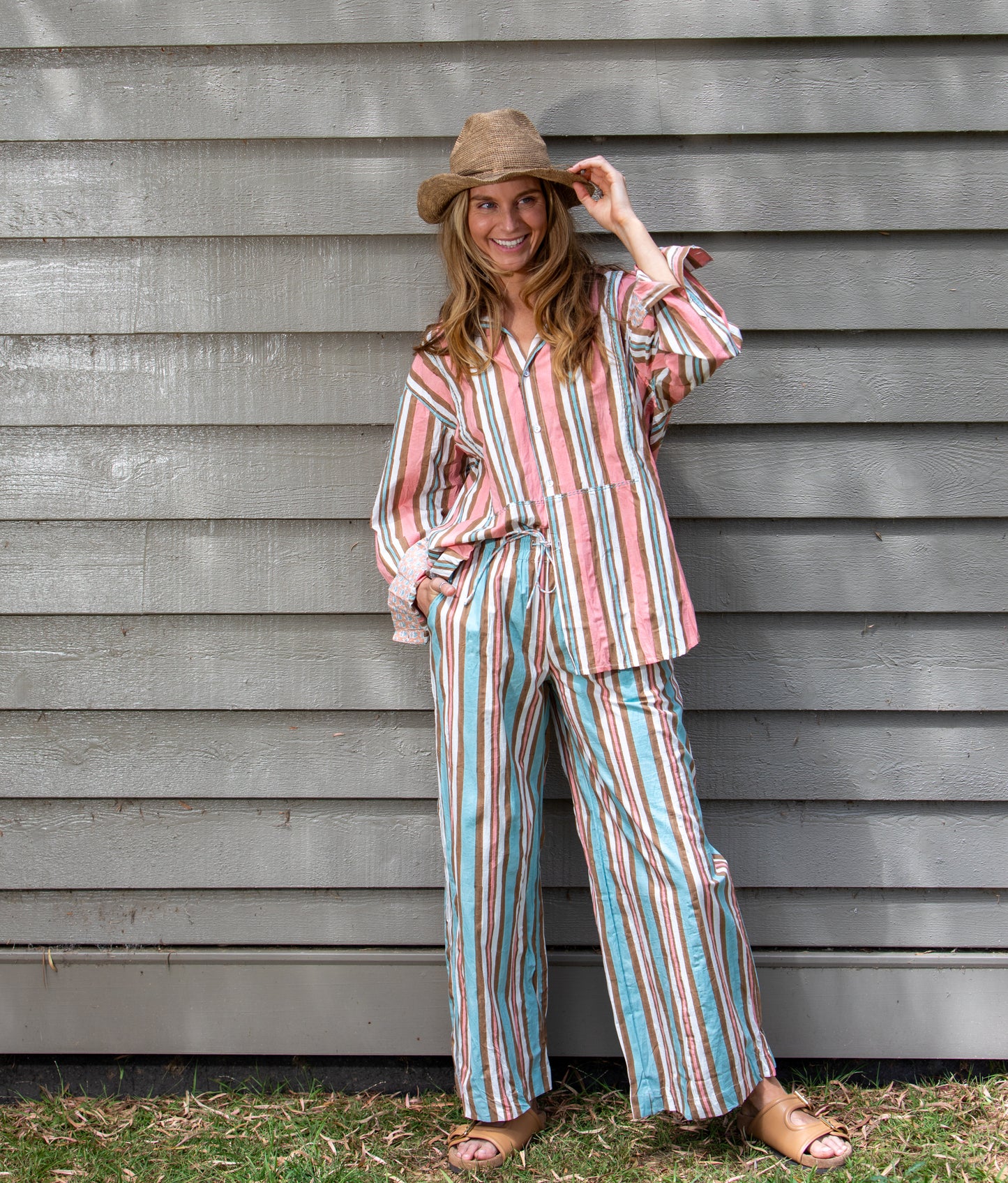 Woman wearing the palazzo pants by Mandalay Designs all natural fibres