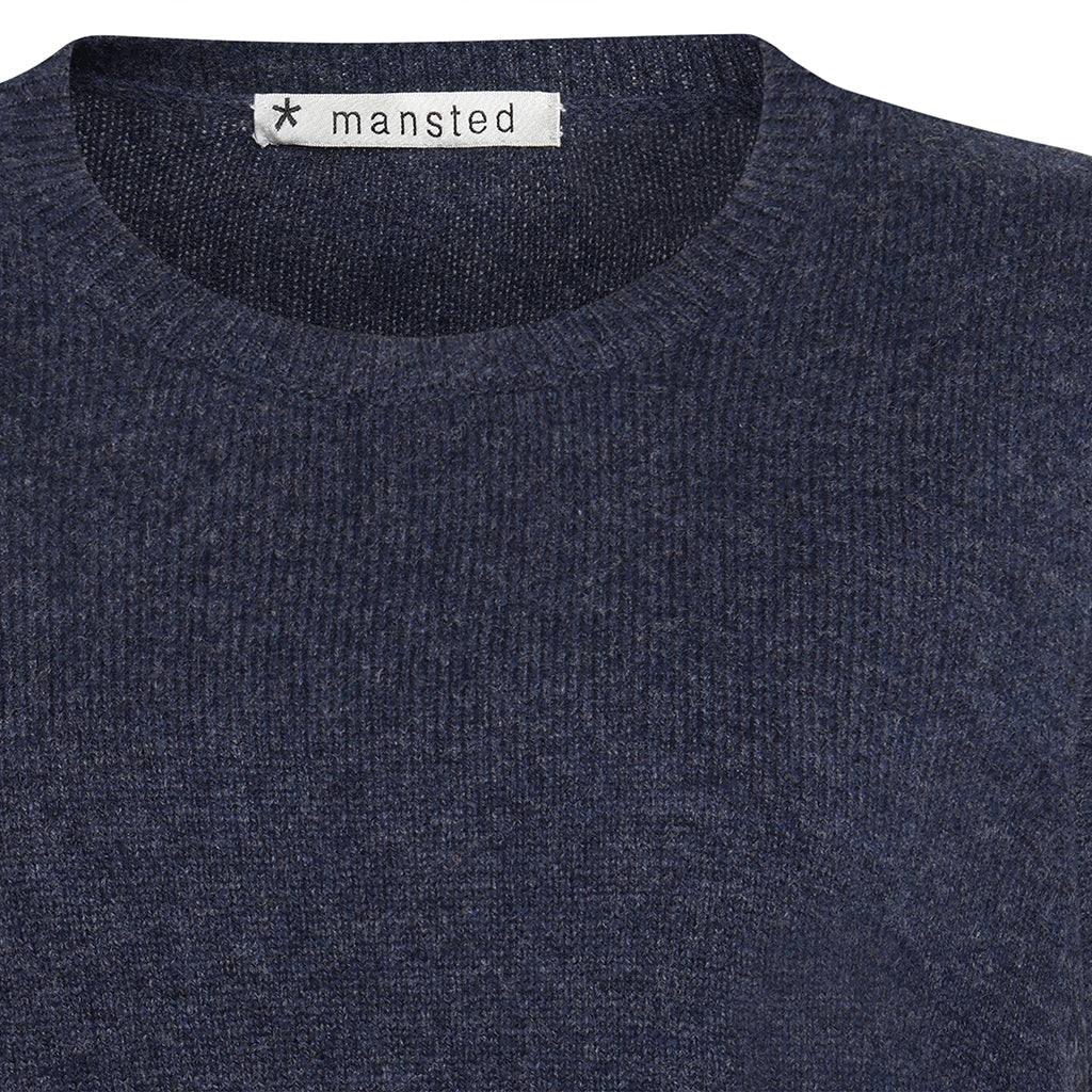 Detail of the Mitos knitted vest in Blue by Mansted