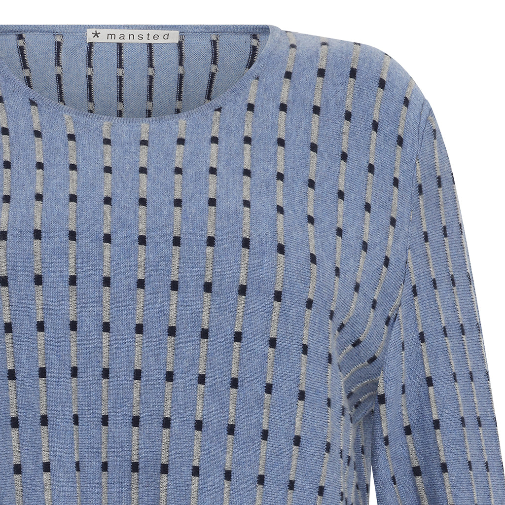 Detail of the Merino cotton Penelope top in Blue by Mansted