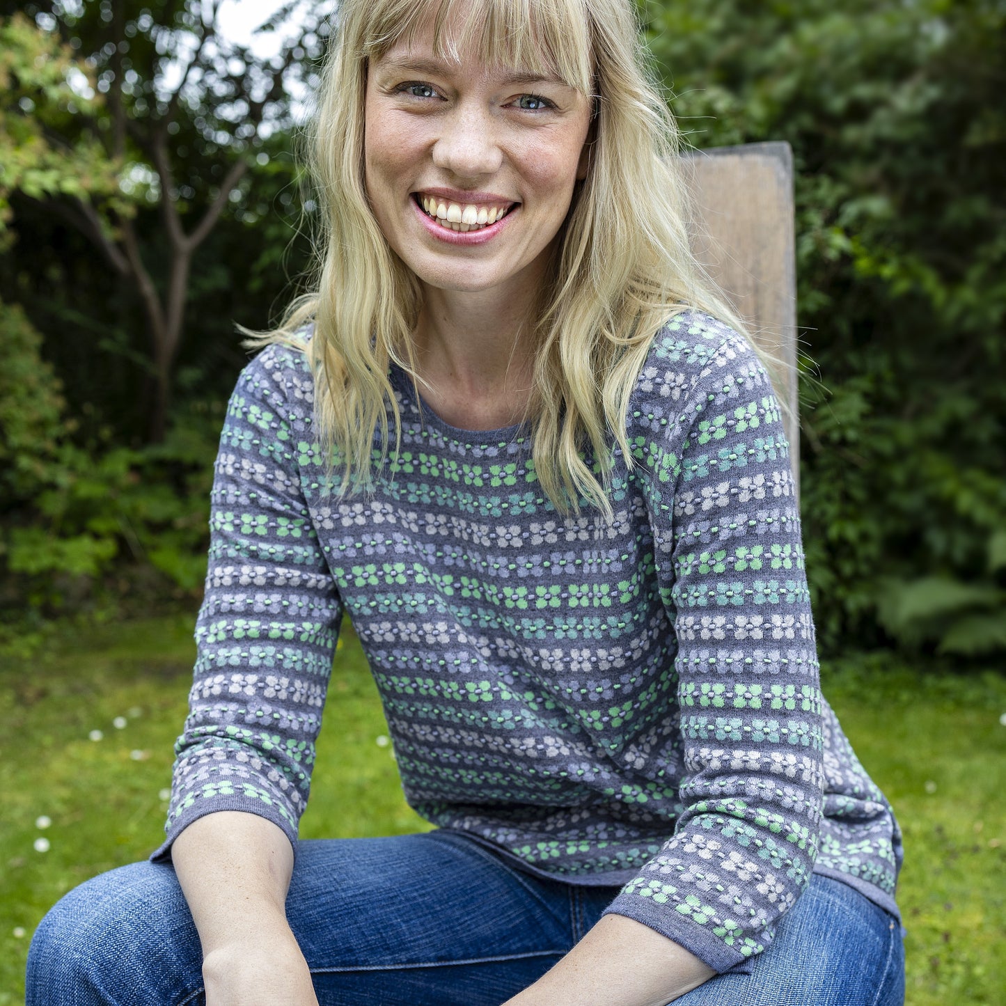 Woman wearing the NOK Ella Top in Soft Blue By Charlotte Mansted.