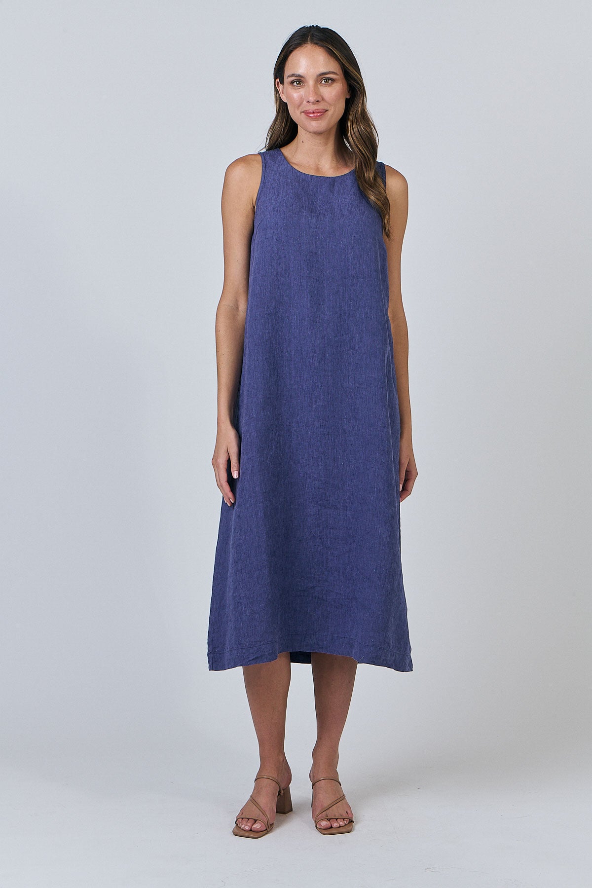Woman wearing Naturals by O&J's Linen midi Dress in Blueberry