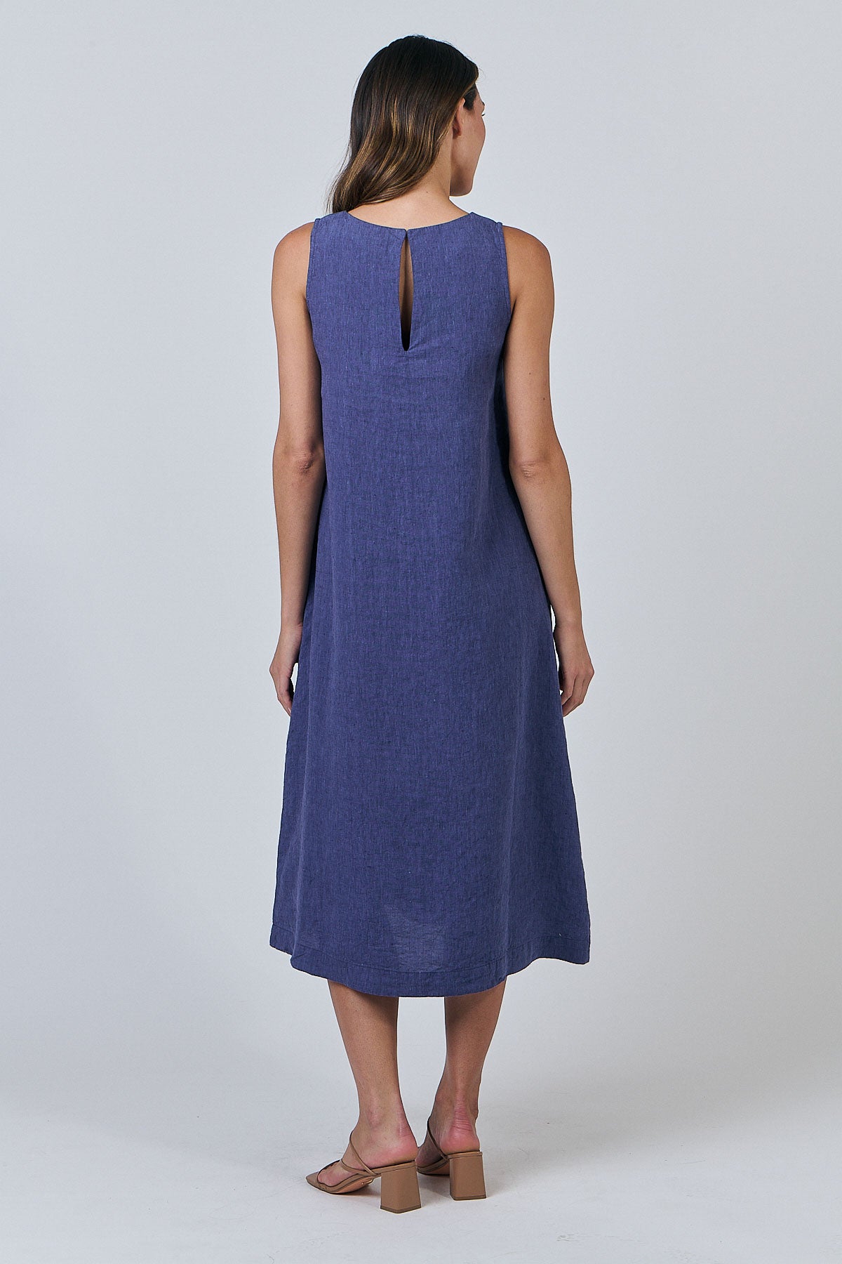 Woman wearing Naturals by O&J's Linen midi Dress in Blueberry