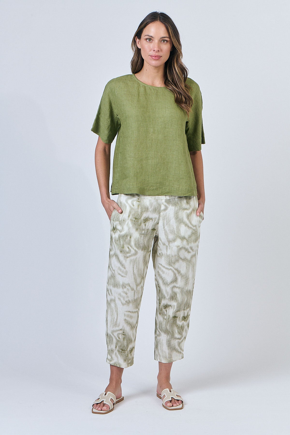 Woman wearing Naturals by O&J's Simple Linen Top in Moss green