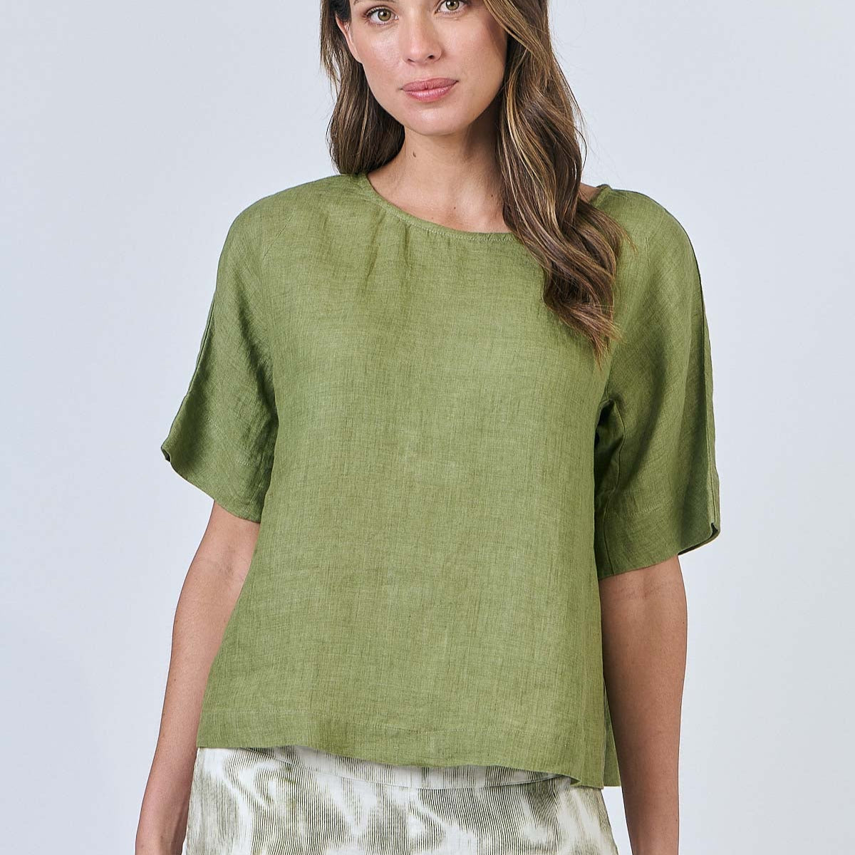 Woman wearing Naturals by O&J's Simple Linen Top in Moss green