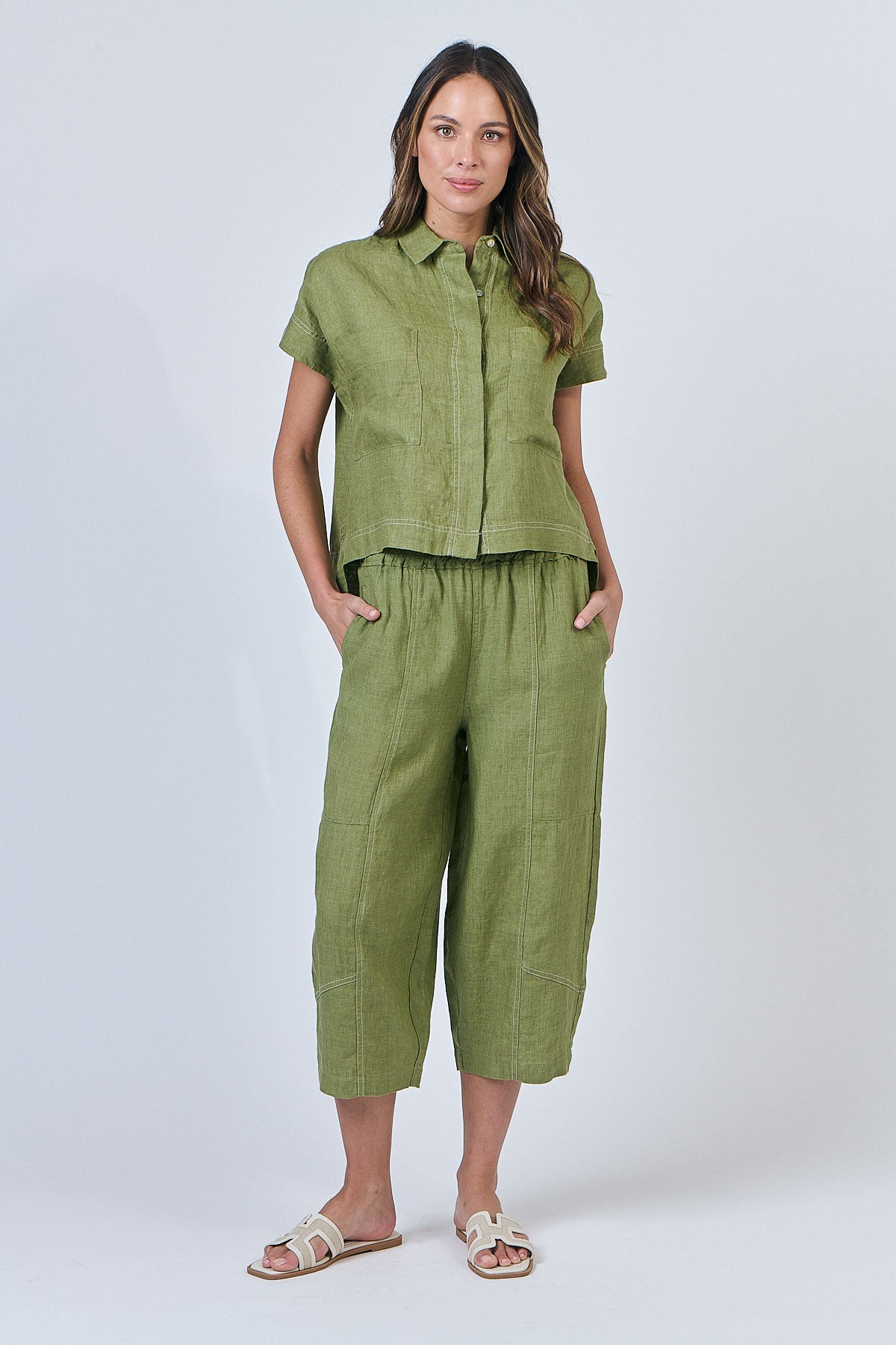 Woman wearing Naturals by O&J's Summer linen Shirt in Moss green