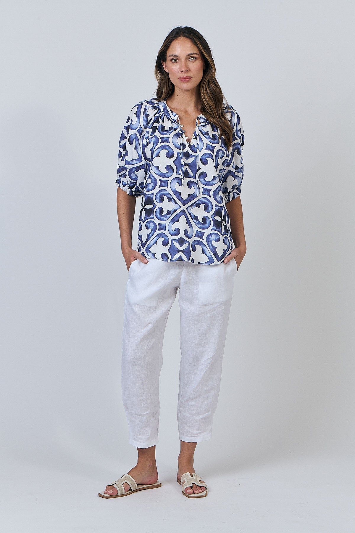 Woman wearing Natural by O&J's Tunic Top in Corfu blue