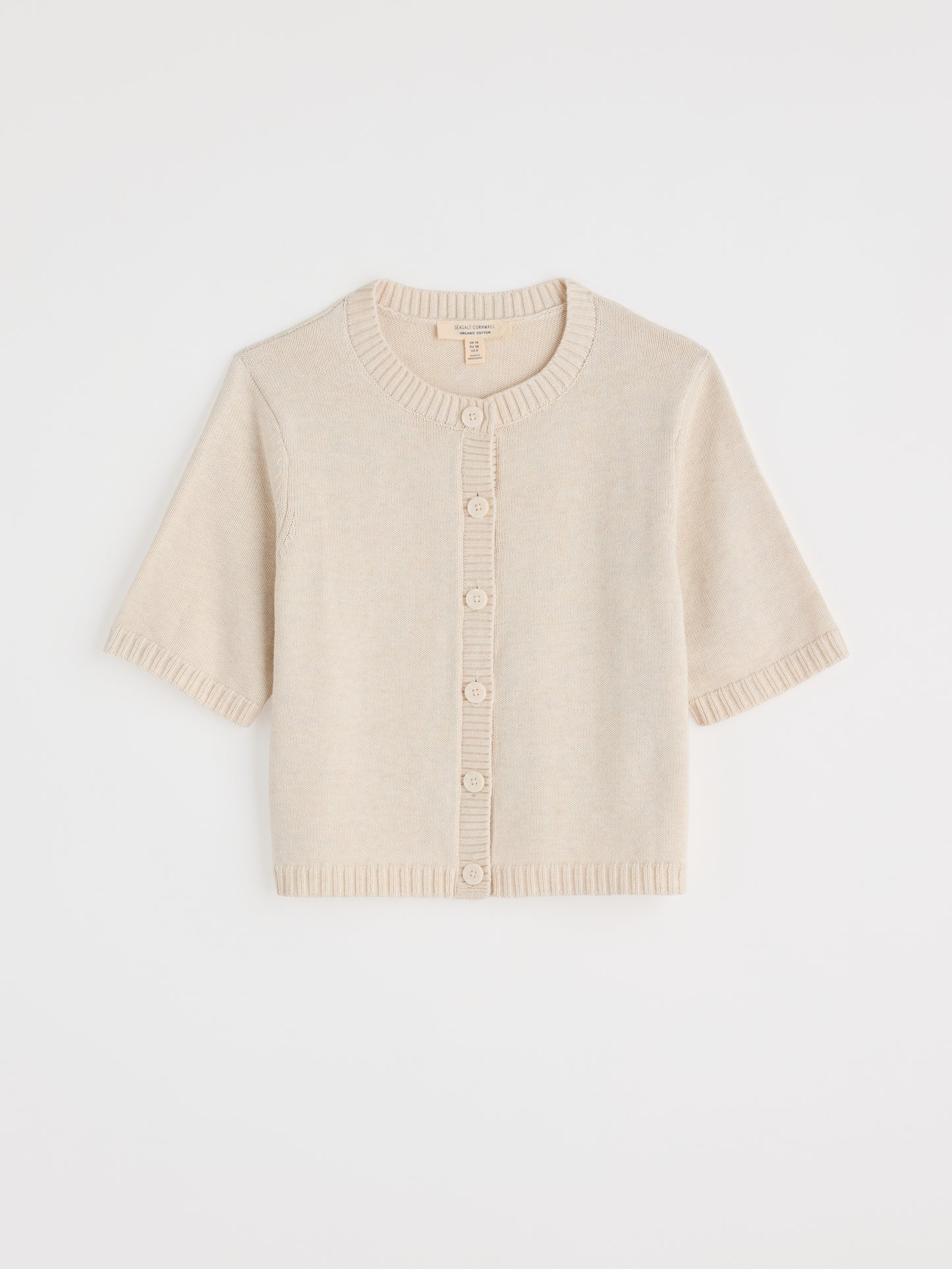 Flat lay of the Gillan Creek cotton short sleeved Cardigan in Chalk by SEASALT