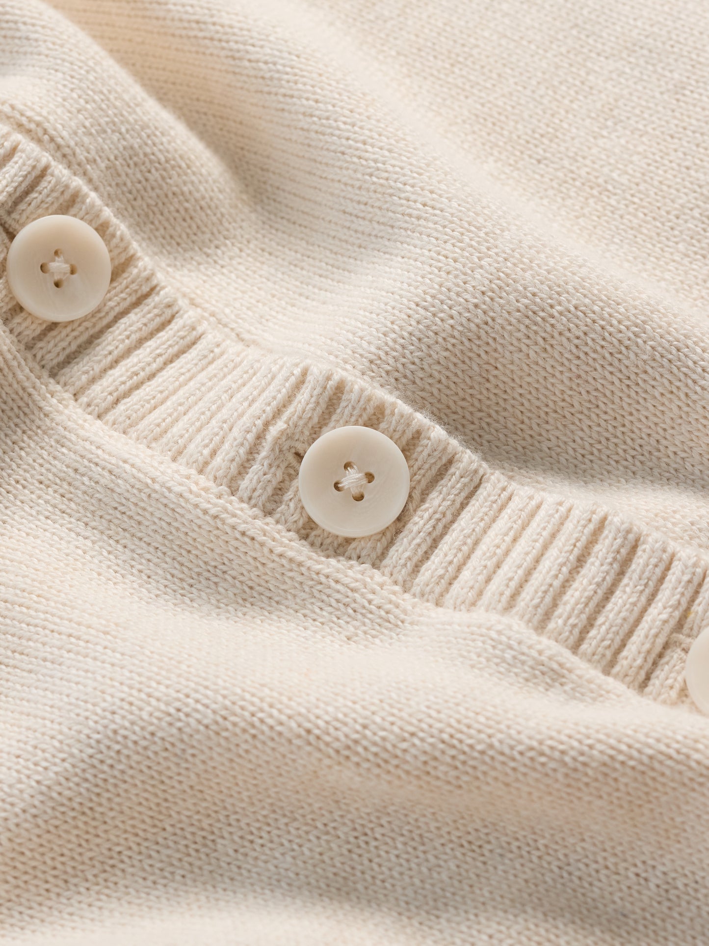 Close up of Chalk cotton knit and buttons by SEASALT