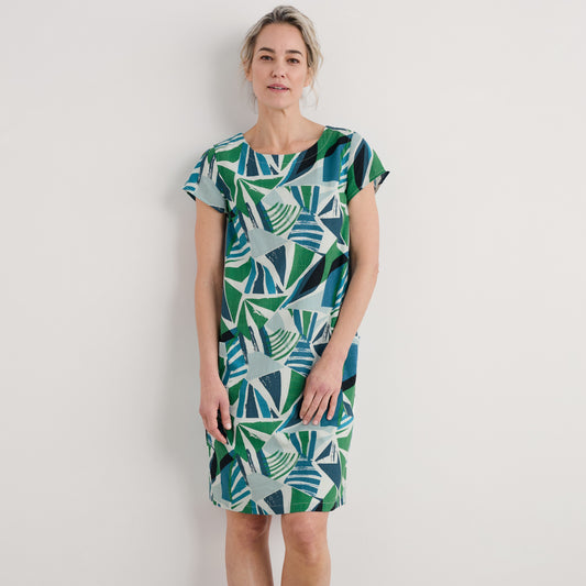 Woman wearing the River Cover cotton shift Dress by SEASALT in Spinnaker Sails Hedgerow