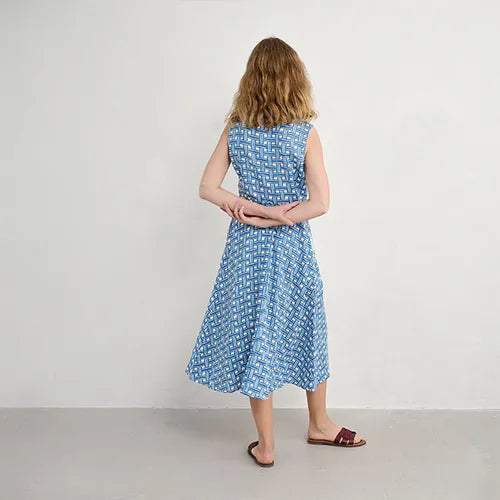 Woman wearing the SEASALT Carved Wood Sleeveless cotton Dress in Deck Weave Cargo print