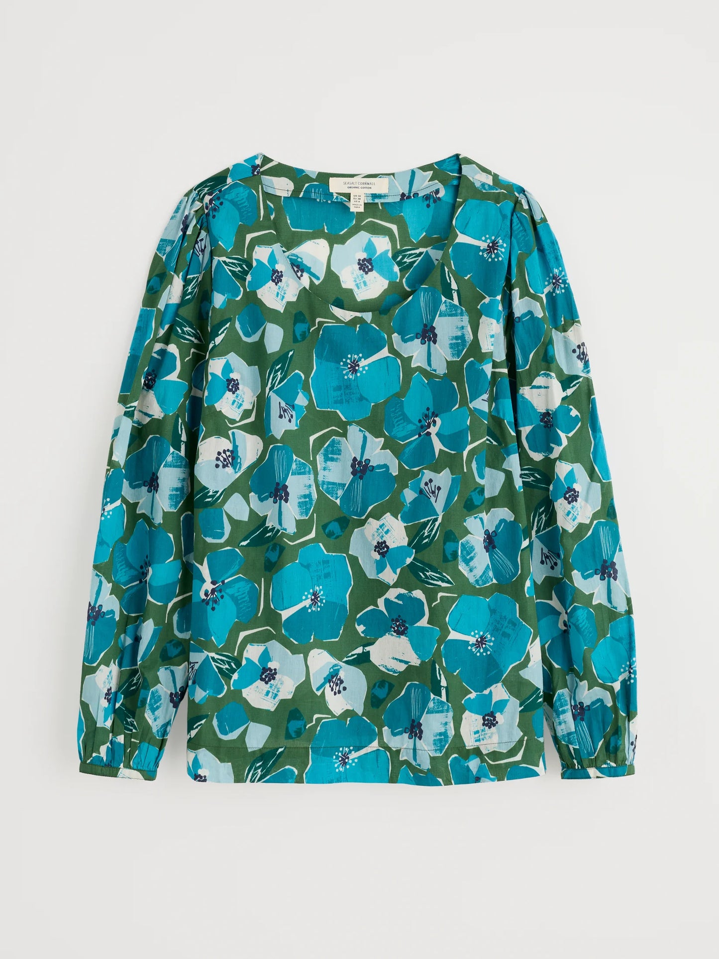 Flat lay of the Quill Top in Paper Hellebores Forest green by SEASALT