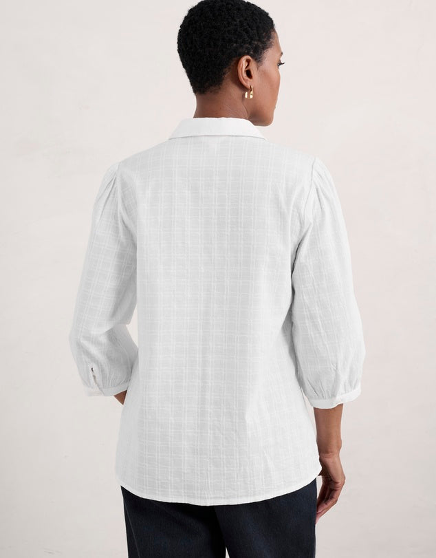 Woman wearing the Hope Cottage white Blouse in Salt by SEASALT