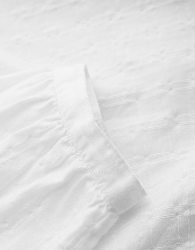 Close up of cotton white Hope Cottage Blouse in Salt by SEASALT