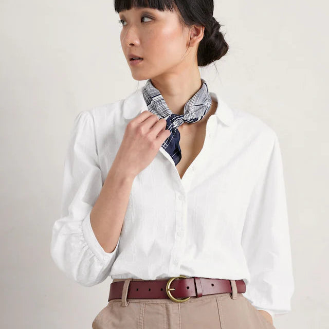 Woman wearing the Hope Cottage Blouse in Salt by SEASALT