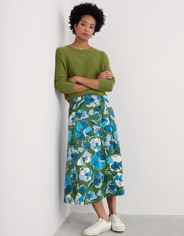 Woman wearing the Makers cotton Jumper by SEASALT in Dark Citron