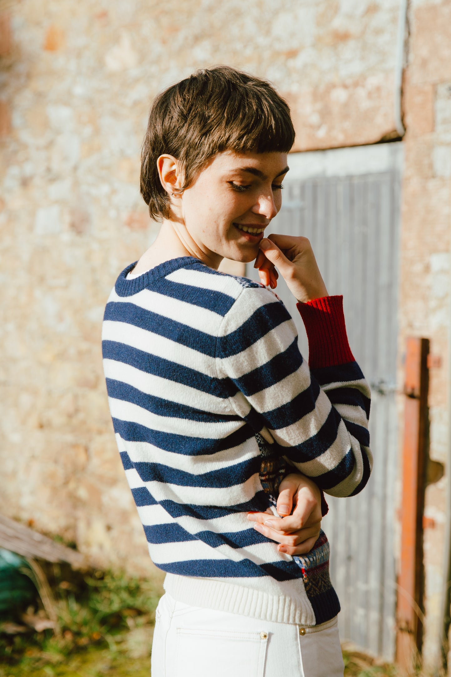 Eribé's Stobo Fair Isle Vee Neck Cardigan in Navy Reflection, back view of stripes