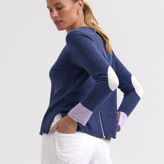 Woman wearing the Elbow Patch Jumper by Zaket and Plover in Denim navy
