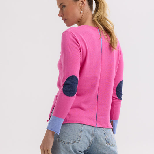 Woman wearing the Elbow Patch Jumper by Zaket and Plover in Pink