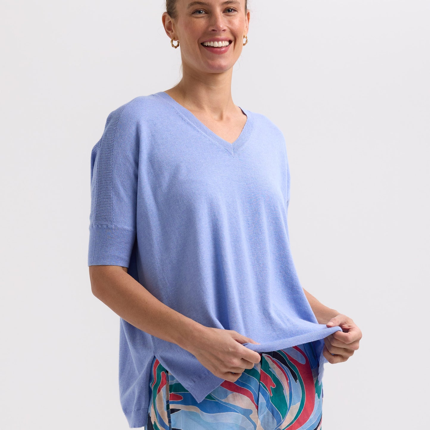 Woman wearing the Pointelle Shoulder Top in Blueberry by Zaket and Plover