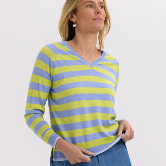 Woman wearing the Essential Stripe Vee cotton Top by Zaket and Plover in Blueberry