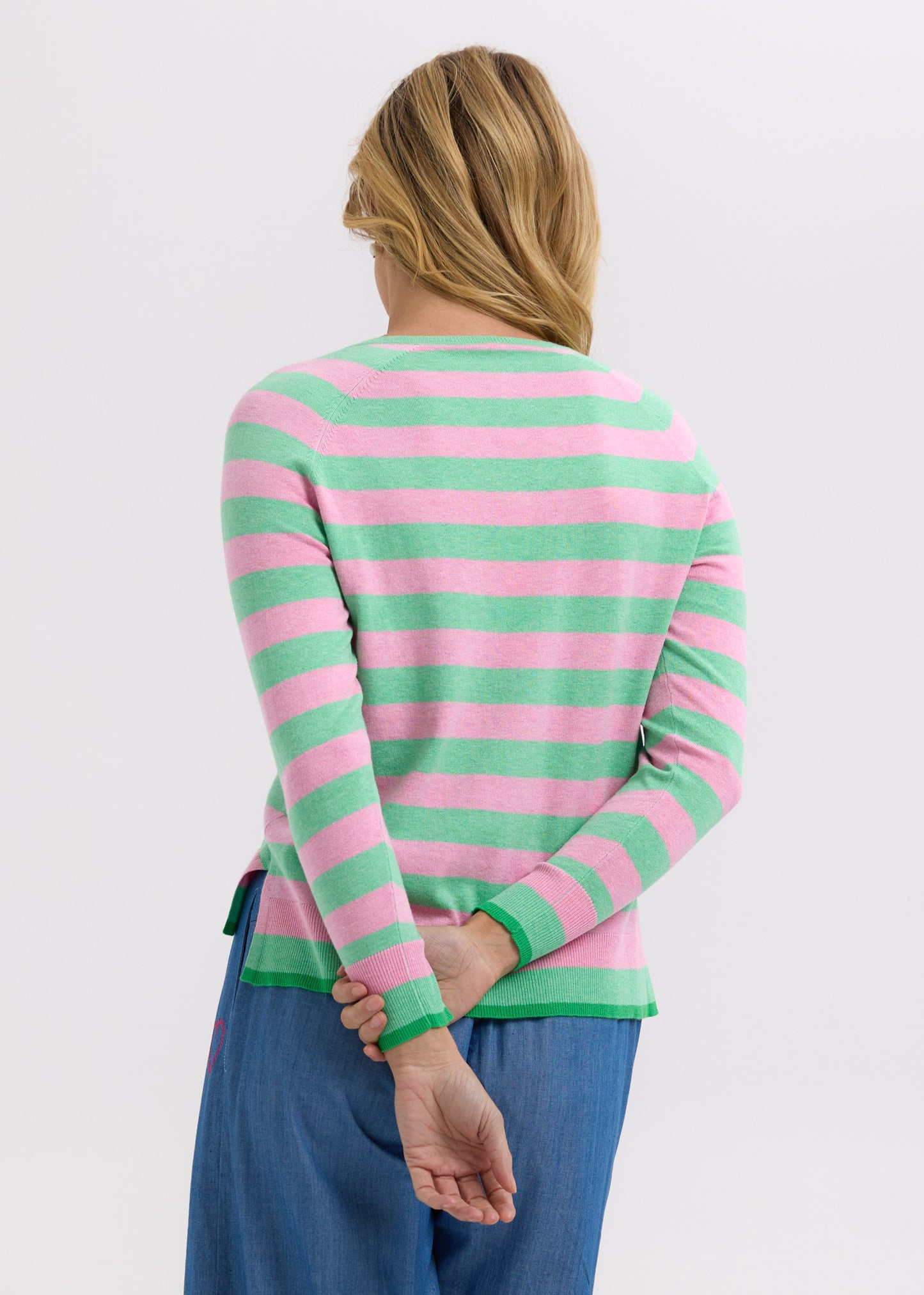 Woman wearing the Essential Striped Vee cotton Top in Spearmint and pink by Zaket and Plover