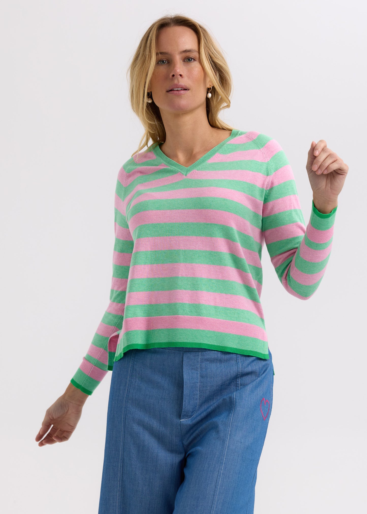 Woman wearing the Essential Striped Vee cotton Top in Spearmint and pink by Zaket and Plover