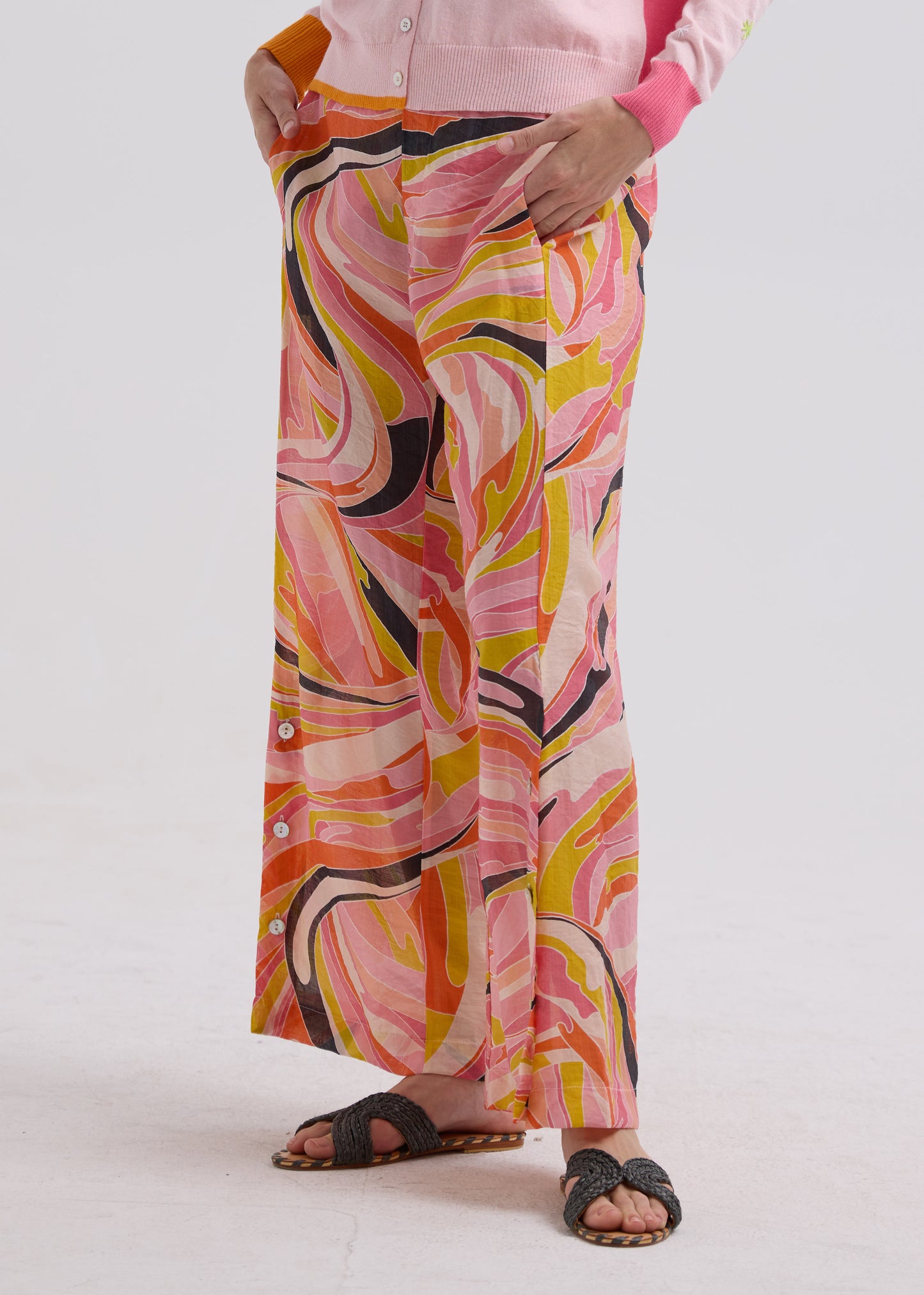 Woman wearing the Summer Pants by Zaket and Plover in Sunset pattern