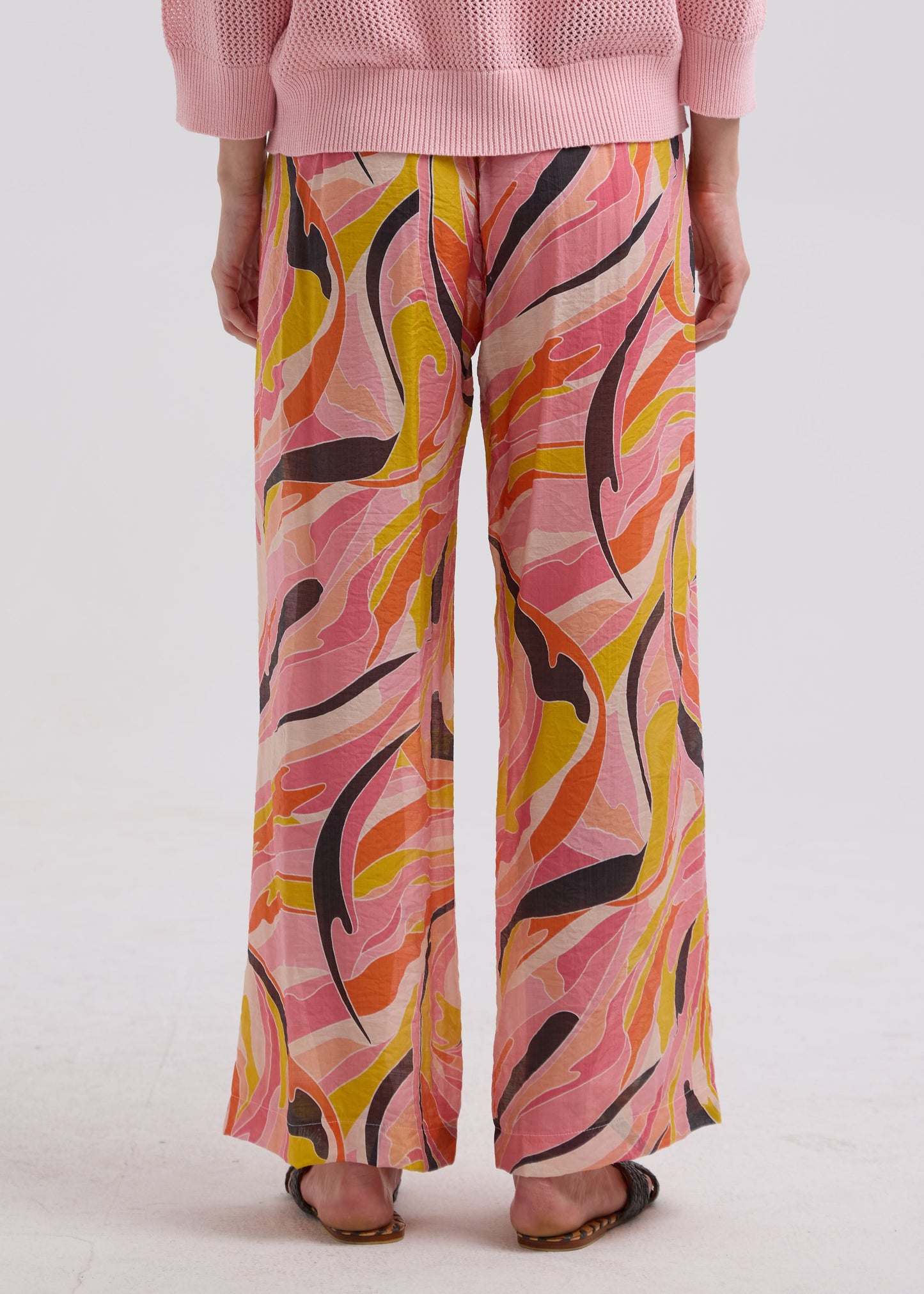 Woman wearing the Summer Pants by Zaket and Plover in Sunset pattern