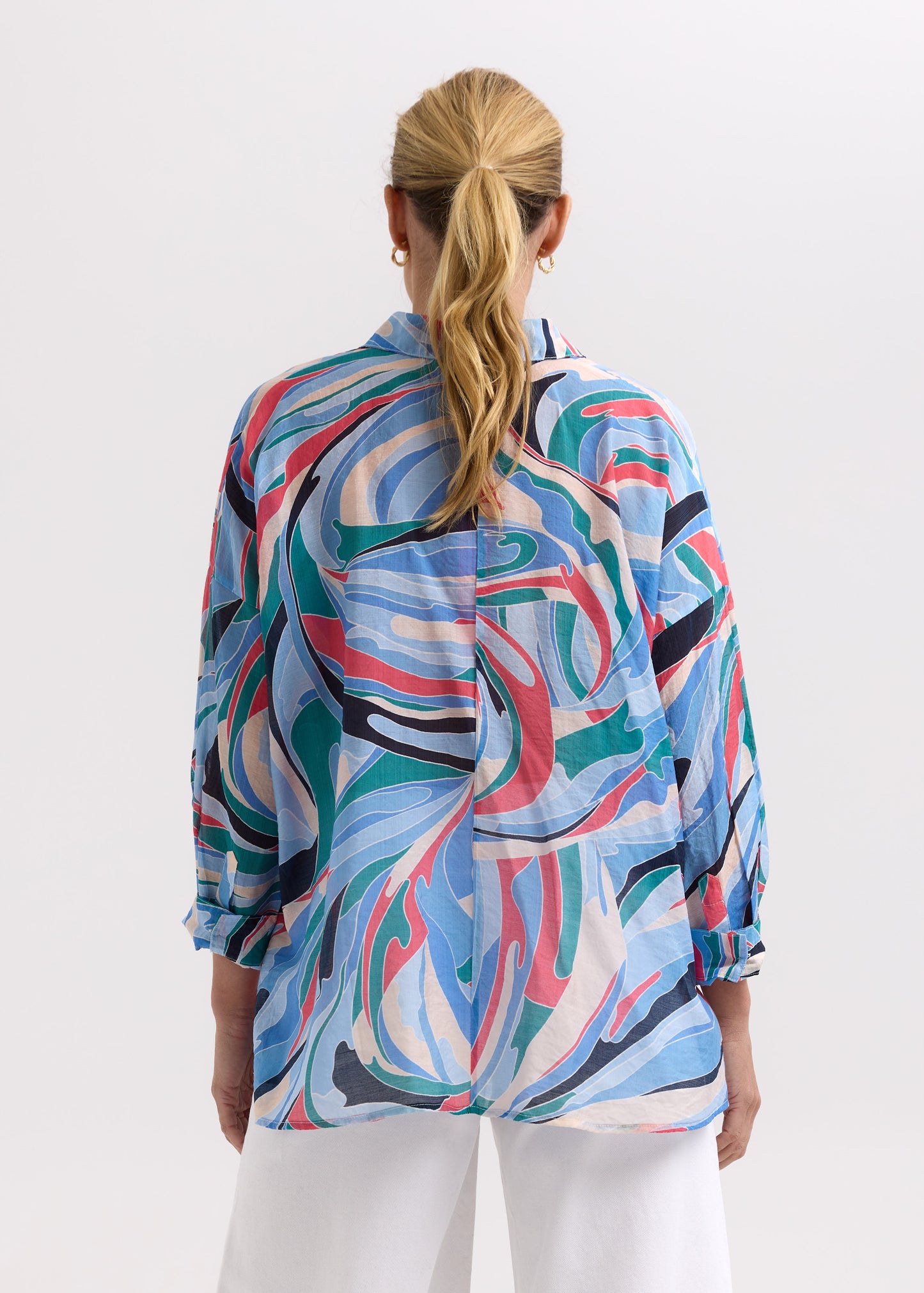 Woman wearing the Summer Shirt by Zaket and Plover in Waves blue