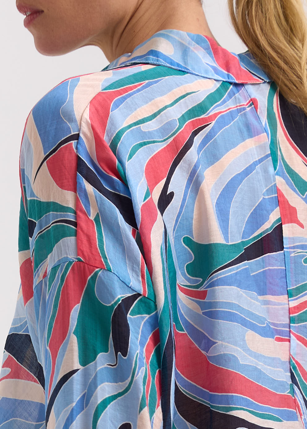 Woman wearing the Summer Shirt by Zaket and Plover in Waves blue