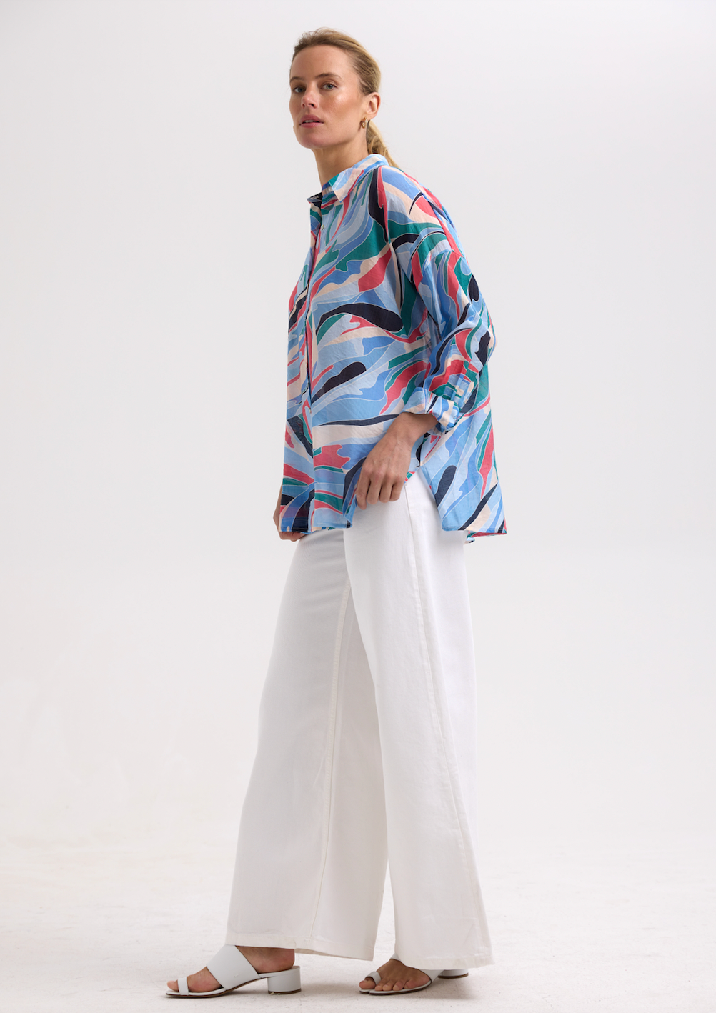 Woman wearing the Summer Shirt by Zaket and Plover in Waves blue