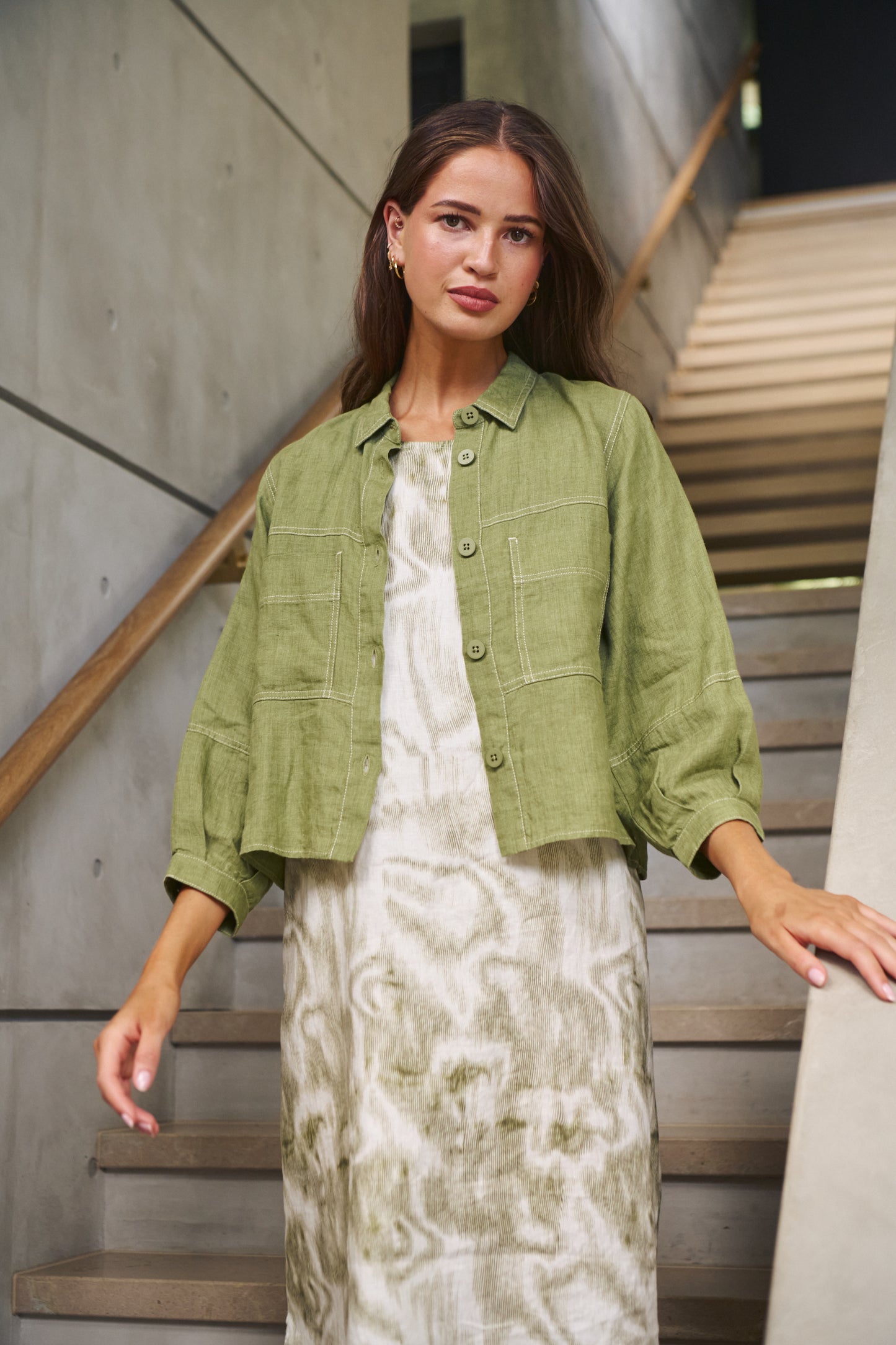 Woman wearing Naturals by O&J's Cropped Jacket in Moss