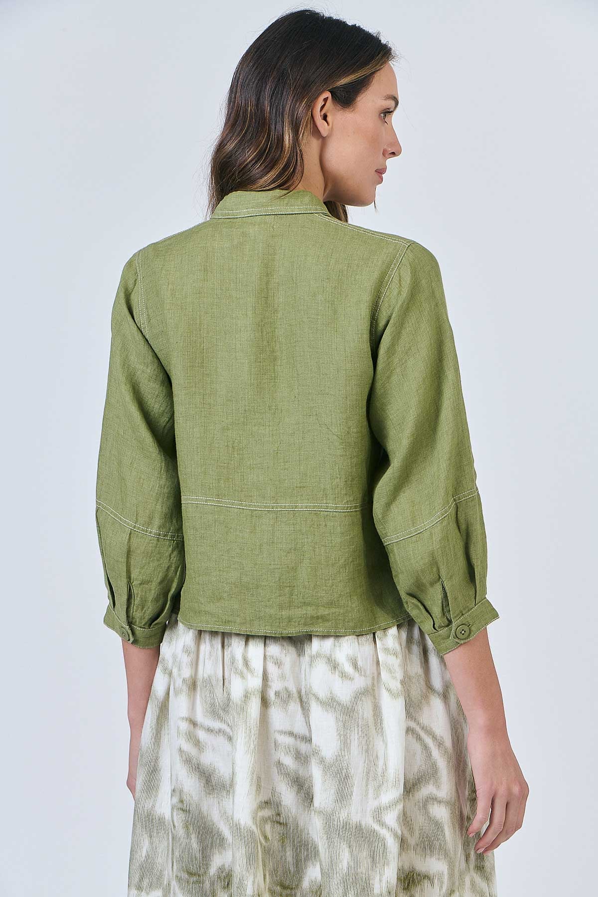 Woman wearing Naturals by O&J's Cropped Jacket in Moss