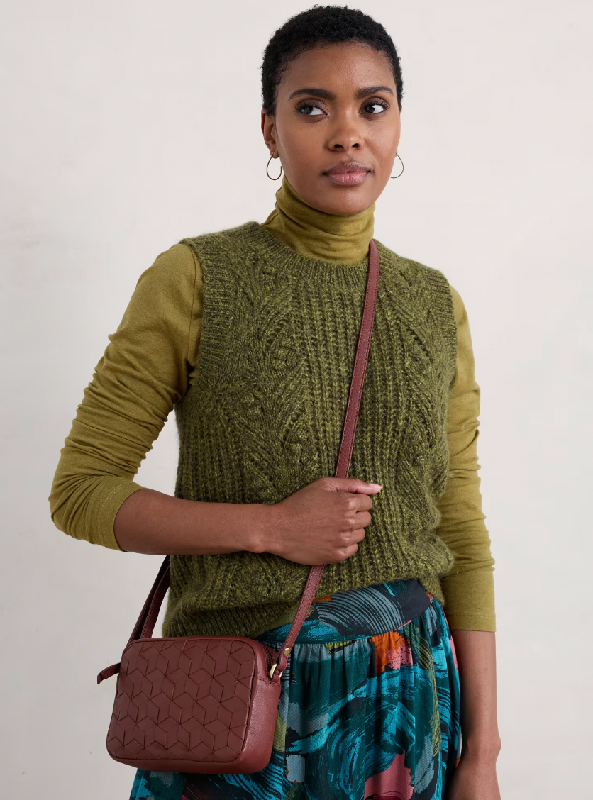 SEASALT's Landing Top in Creek, styled with vest and bag