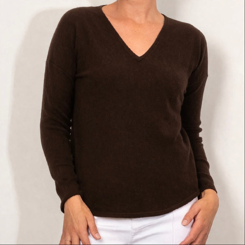 Woman wearing a Vee Neck slim Jumper by Bridge and Lord in chocolate