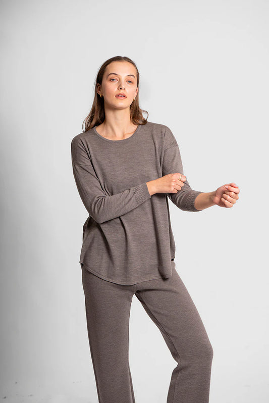 Woman wearing the Bridge and Lord Merino Milano Pants in Latte