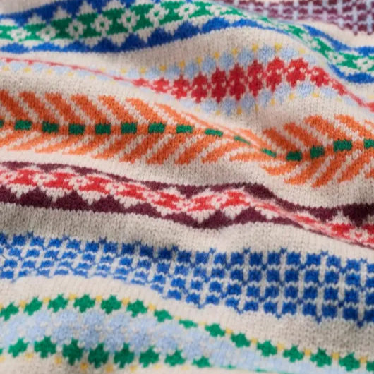 Close up of the Percella Cove knitted vest in Abstraction Multi by SEASALT fair isle pattern