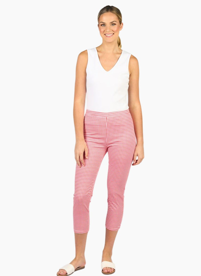 Woman wearing the printed pull on cotton pants in red gingham by Vassalli