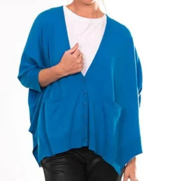 Australian Merino Wool and cashmere from bridge and Lord. A ladies vee neck cardigan in blue.