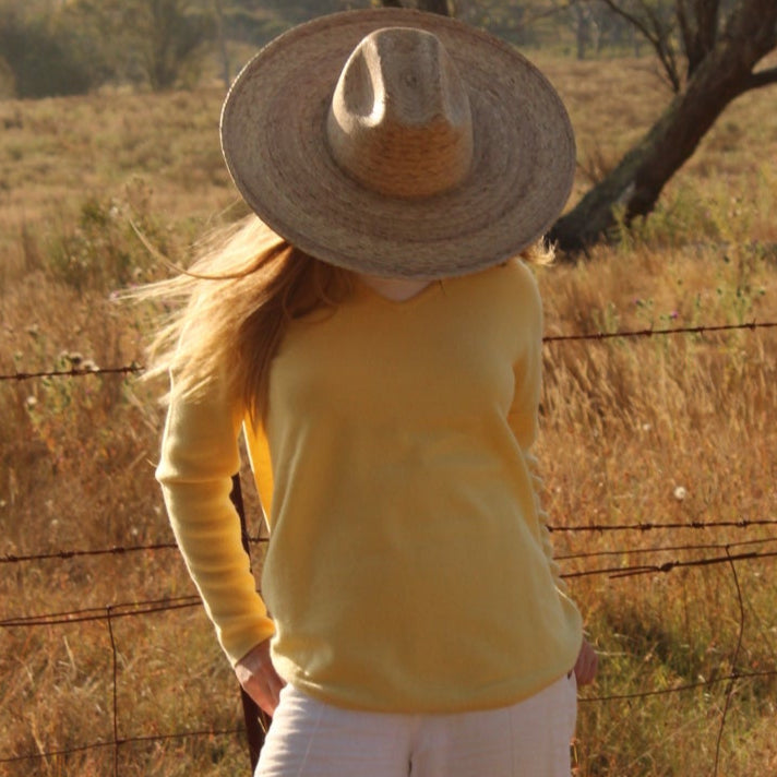 Bridge and Lord women's Cashmere Vee Pullover in daffodil
