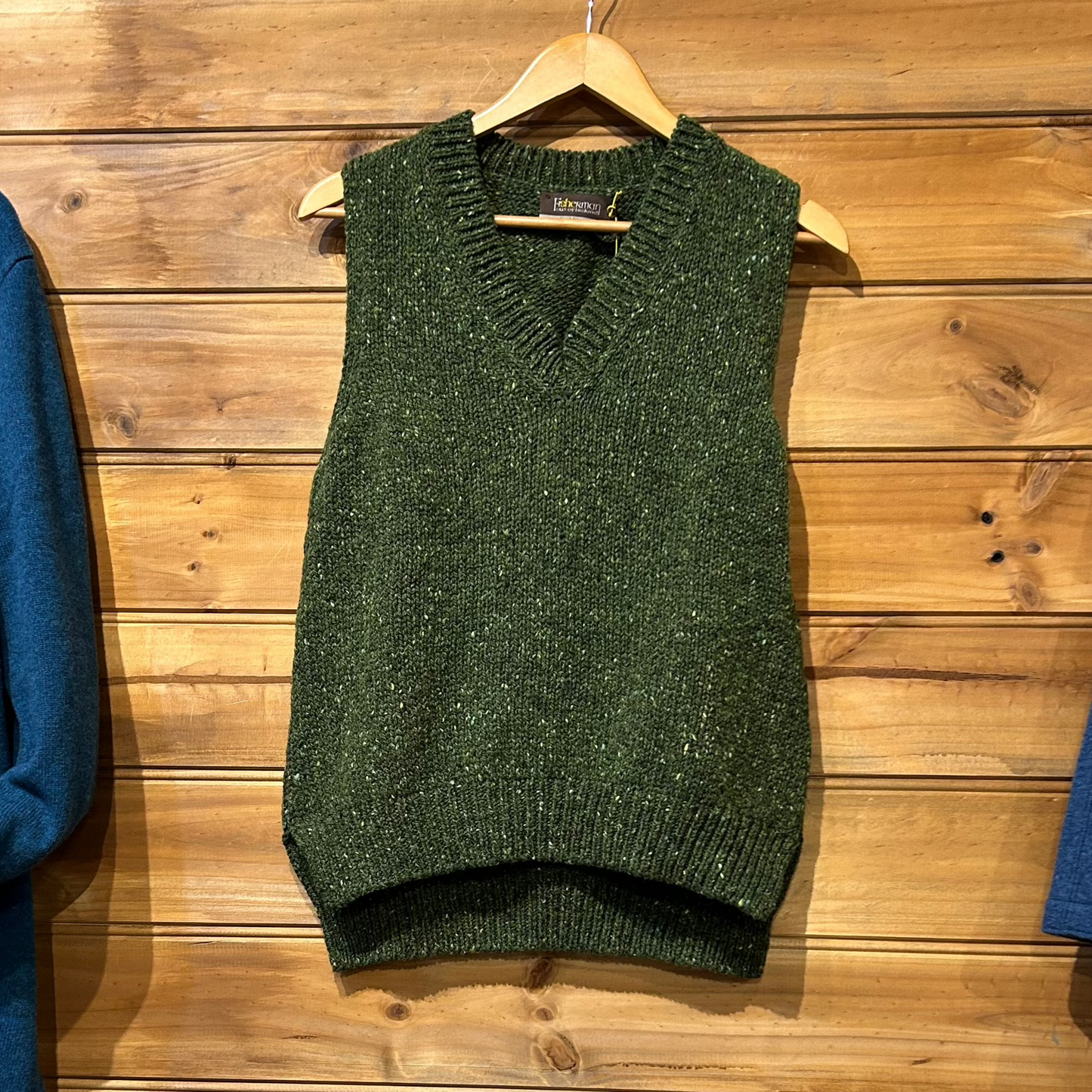 Quality chunky green vest in merino wool for women.