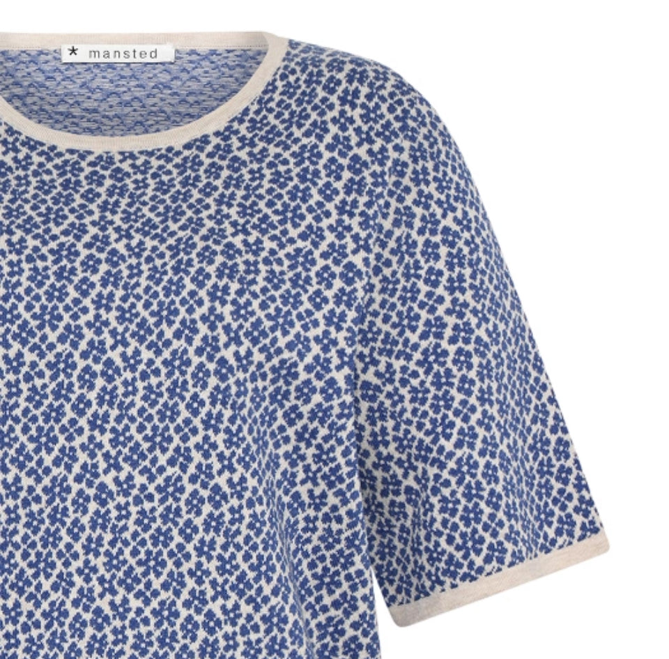Close up of the floral Floss cotton Top in Blue by Mansted